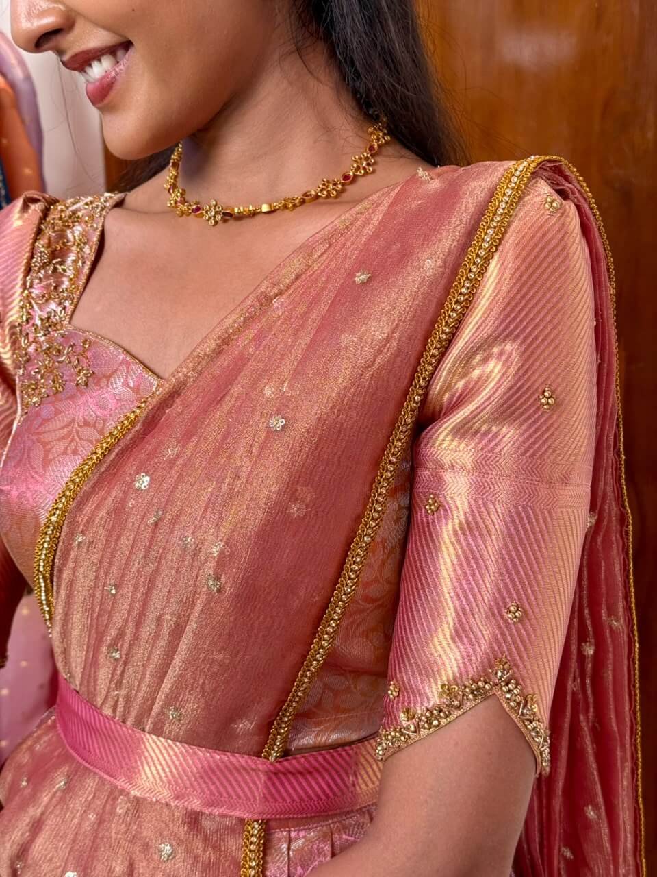 Rose gold DIVINE lehenga with hand aari work