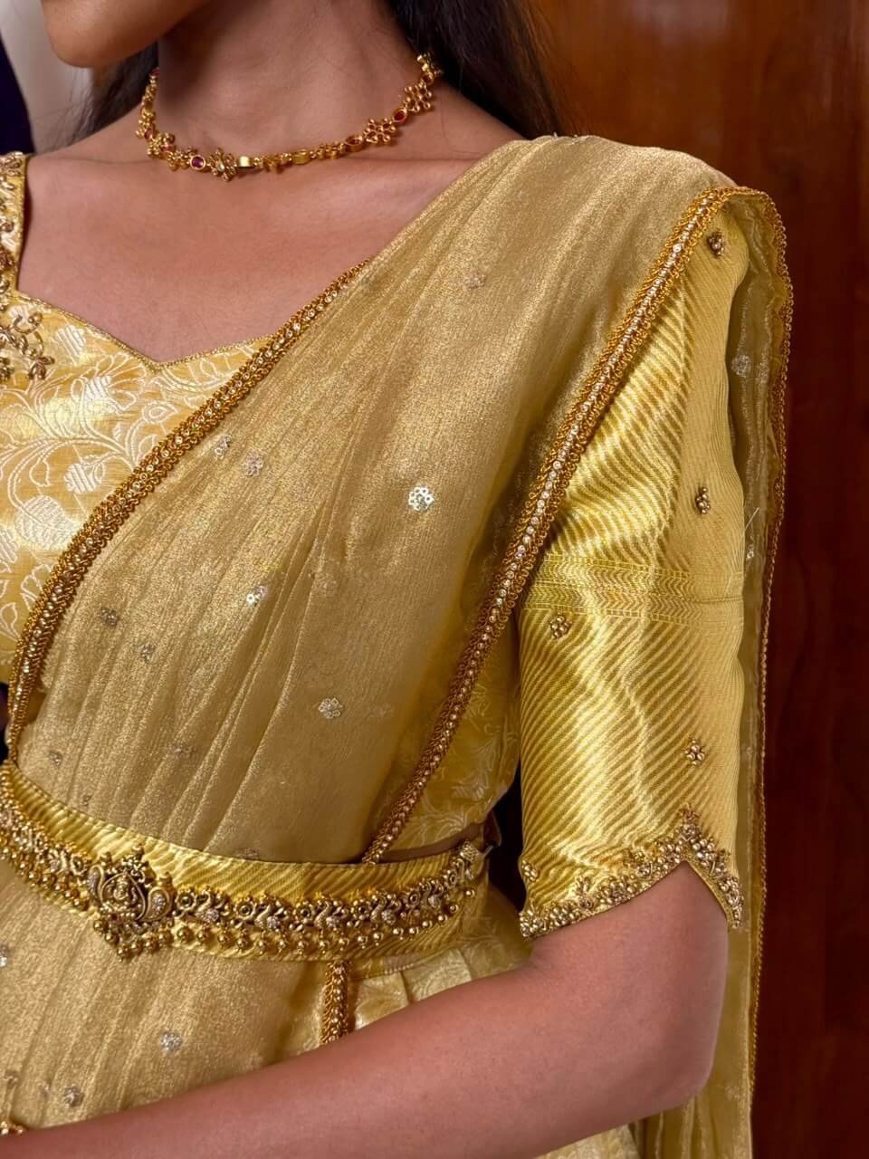 Lemon gold DIVINE lehenga with hand aari work