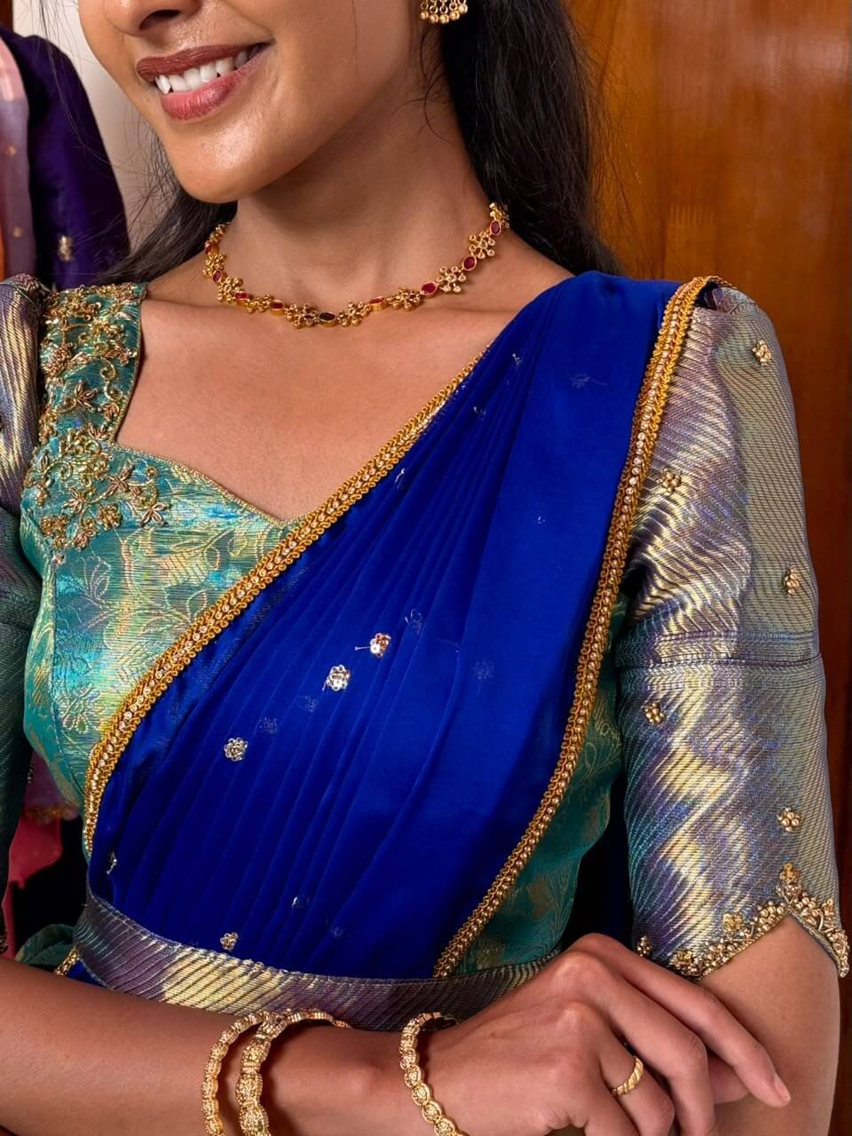 Blue DIVINE lehenga with hand aari work